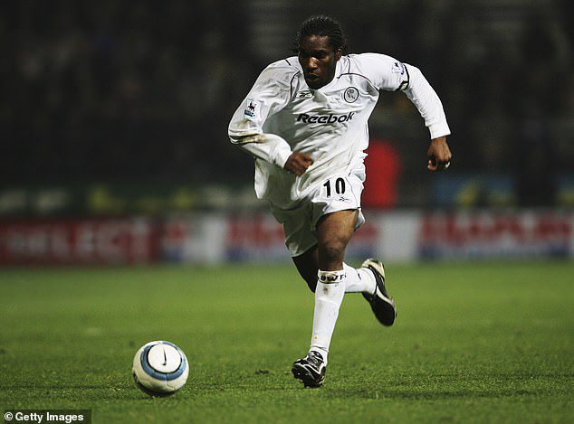 okocha in action for bolton6668380397024422549.